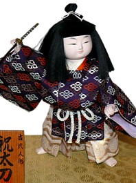 japanese doll of a young samurai with tachi sword, 1960's