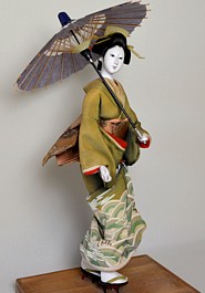 japanese antique doll of a geisha with umbrella, 1930's