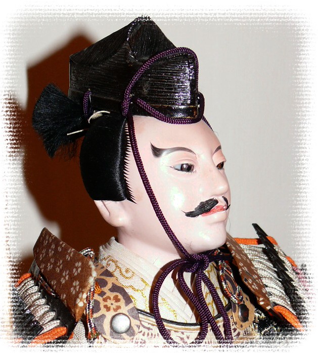 japanese doll of a samurai warrior, antique