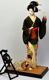 japanese antique doll of a woman with mirror, 1950's