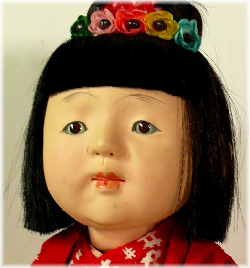 japanese antique doll of a little girl