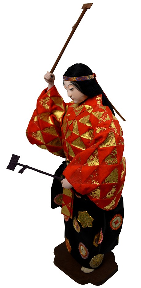 Japanese doll with mask and hammers in her hands