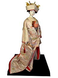 japanese bride doll dressed in wedding kimono and with head scarf, 1950's