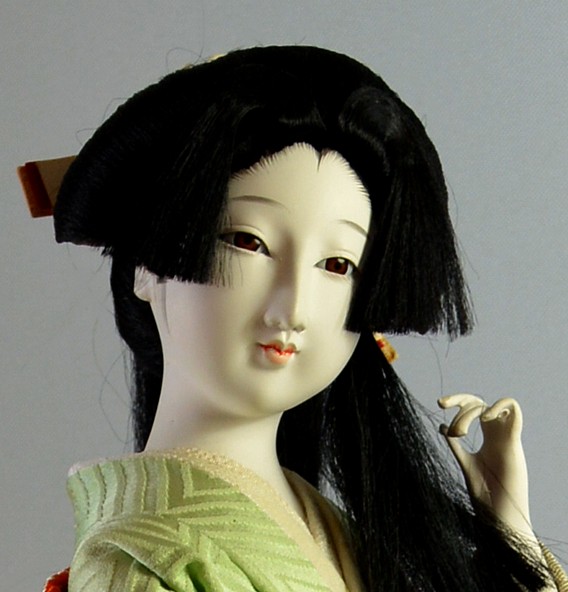 japanese traditional doll of a  long-hair young noble lady