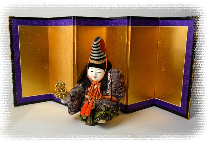 japanese traditional doll and golden screen