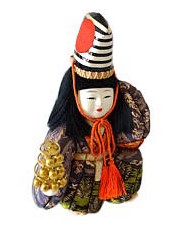 japanese vintage kimekomi doll of a boy with bell