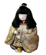 japanese traditional doll of boy with bell