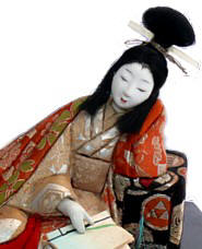 Japanese antique figurine of a lady with book, 1930's