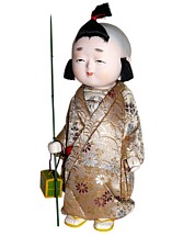 Japanese  antique kimekomi doll of a boy with twig and cage, 1950's