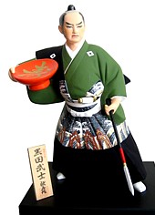 Samurai Warrior with sake cup, Hakata Figurine 