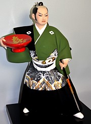 Samurai Warrior with sake cup, Hakata Figurine 