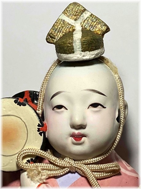 Japanese antique ceramic doll of a little boy-musician