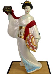 japanese hakata doll of a geisha dancing with Lion mask