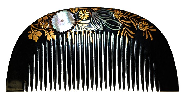 japanese art: wooden hair comb with mother-of-pearl inlay