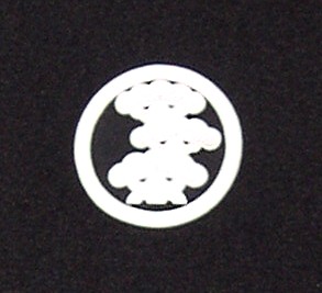 samurai family mon or crest on japanese black silk kimono